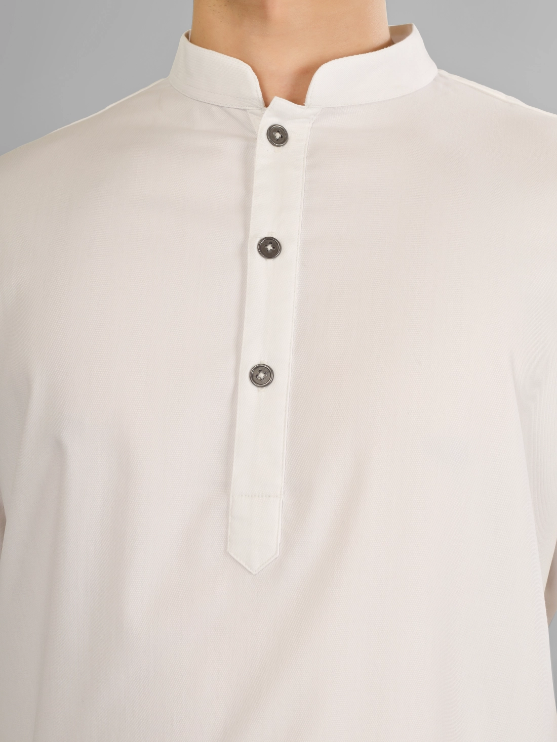 boy wearing white kurta pajama