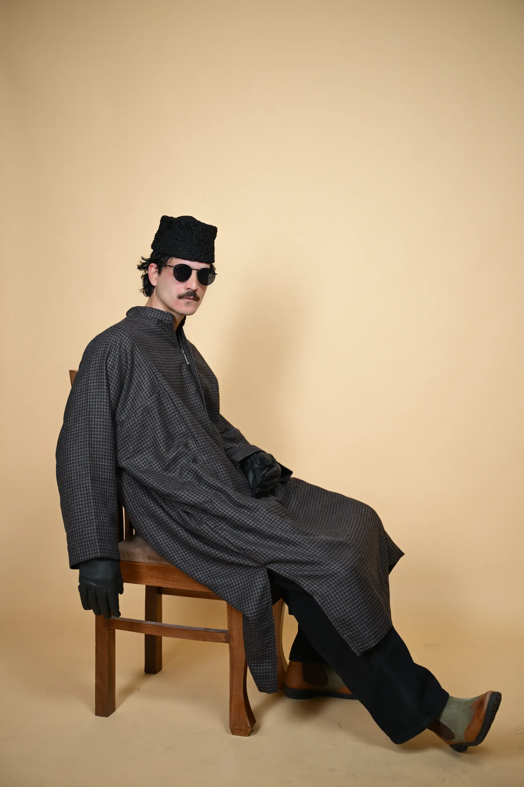 men wearing Kashmiri pheran