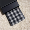 black with white bold check.