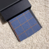 dusty blue with tan houndstooth.