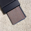 warm beige with pin stripes.